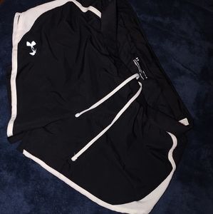 Under Armour Women's-size M active shorts. Black and White